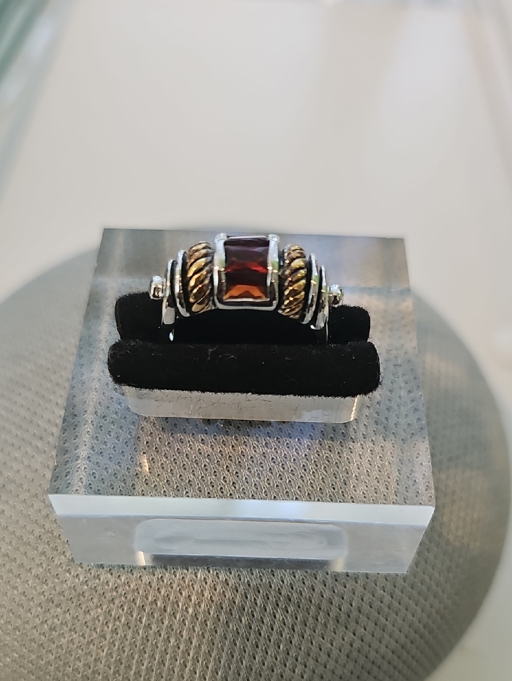 Sterling Silver Ring with Garnet Red Stone and Gold Accents